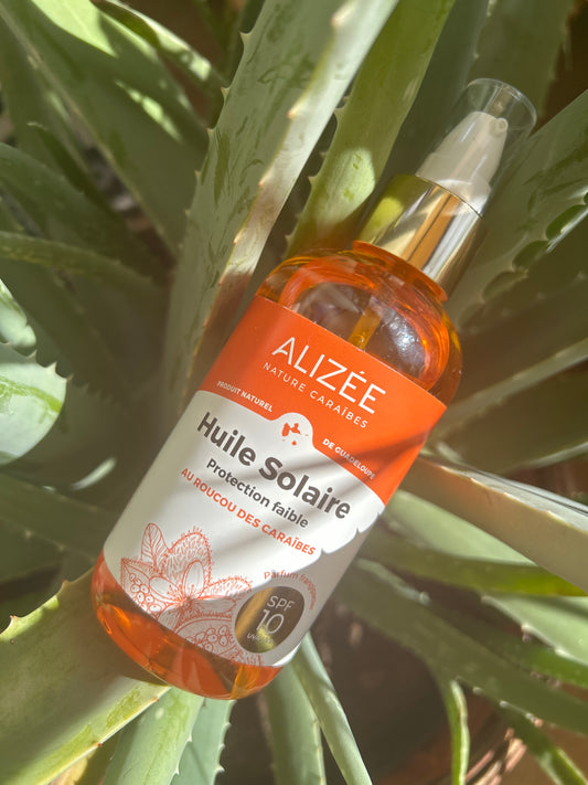 Huile solaire protection faible au roucou SPF10 de Guadeloupe